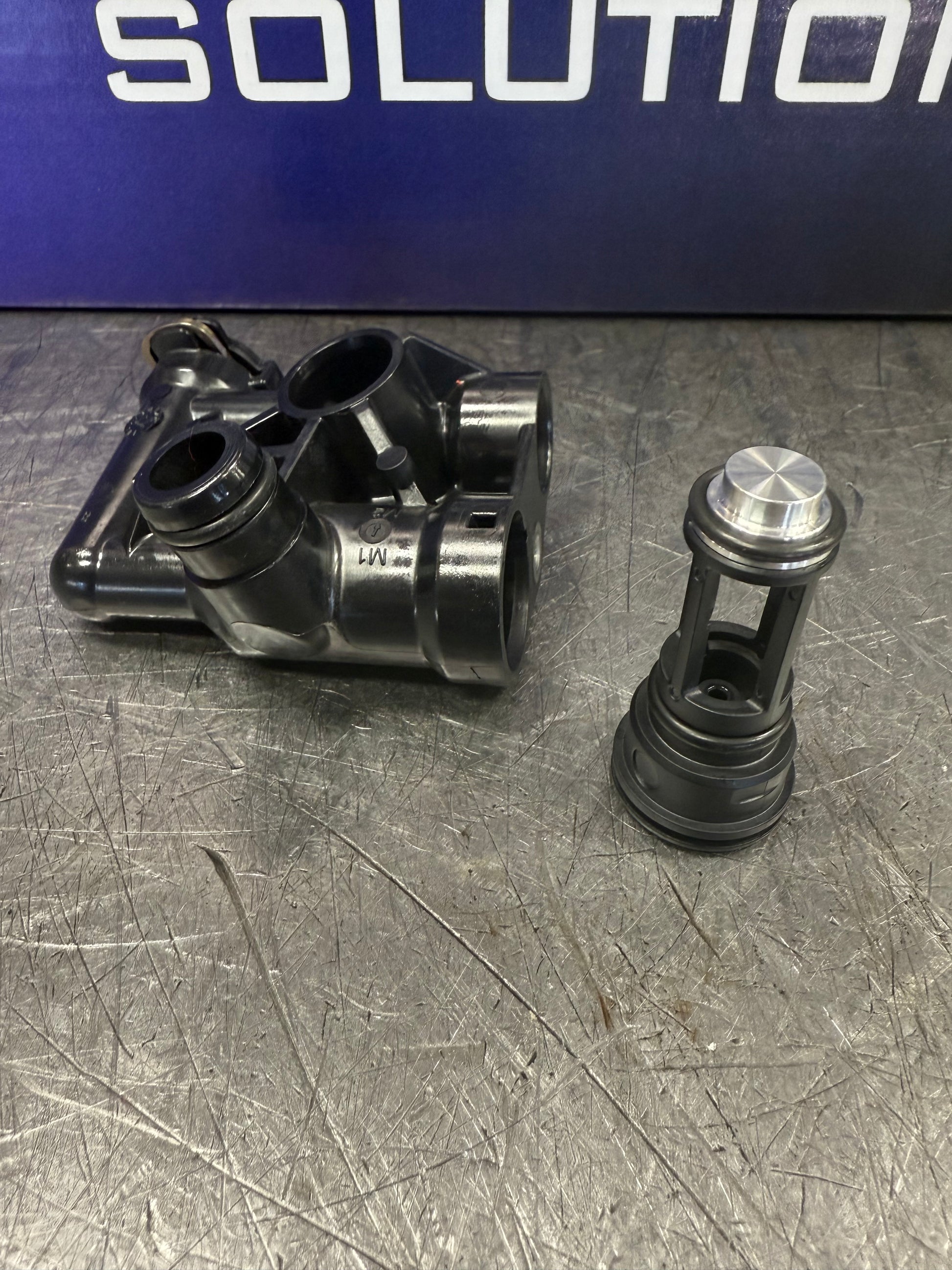 ATS thermostat delete plug for BMW ZF8HP transmission cooler flow upgrade and improved transmission cooling